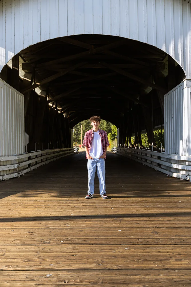 Portrait inside a wooden covered bridge