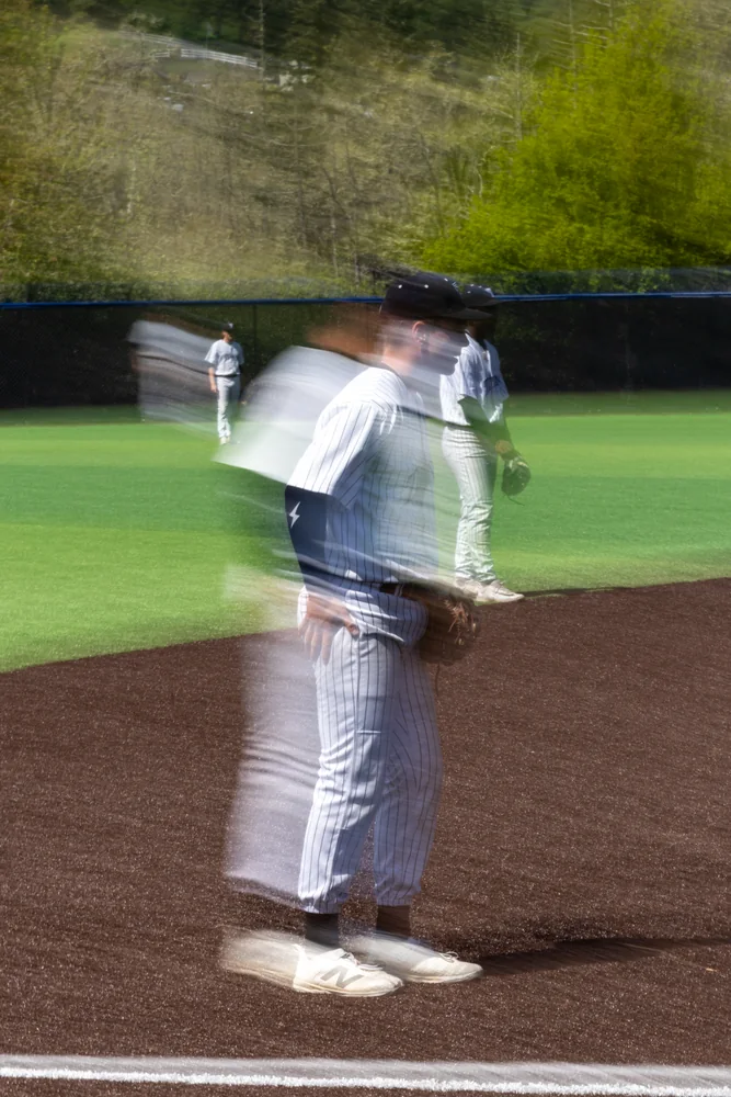 Motion-blurred baseball player on the infield